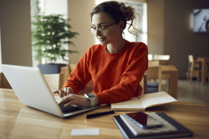 woman behind laptop woman behind laptop