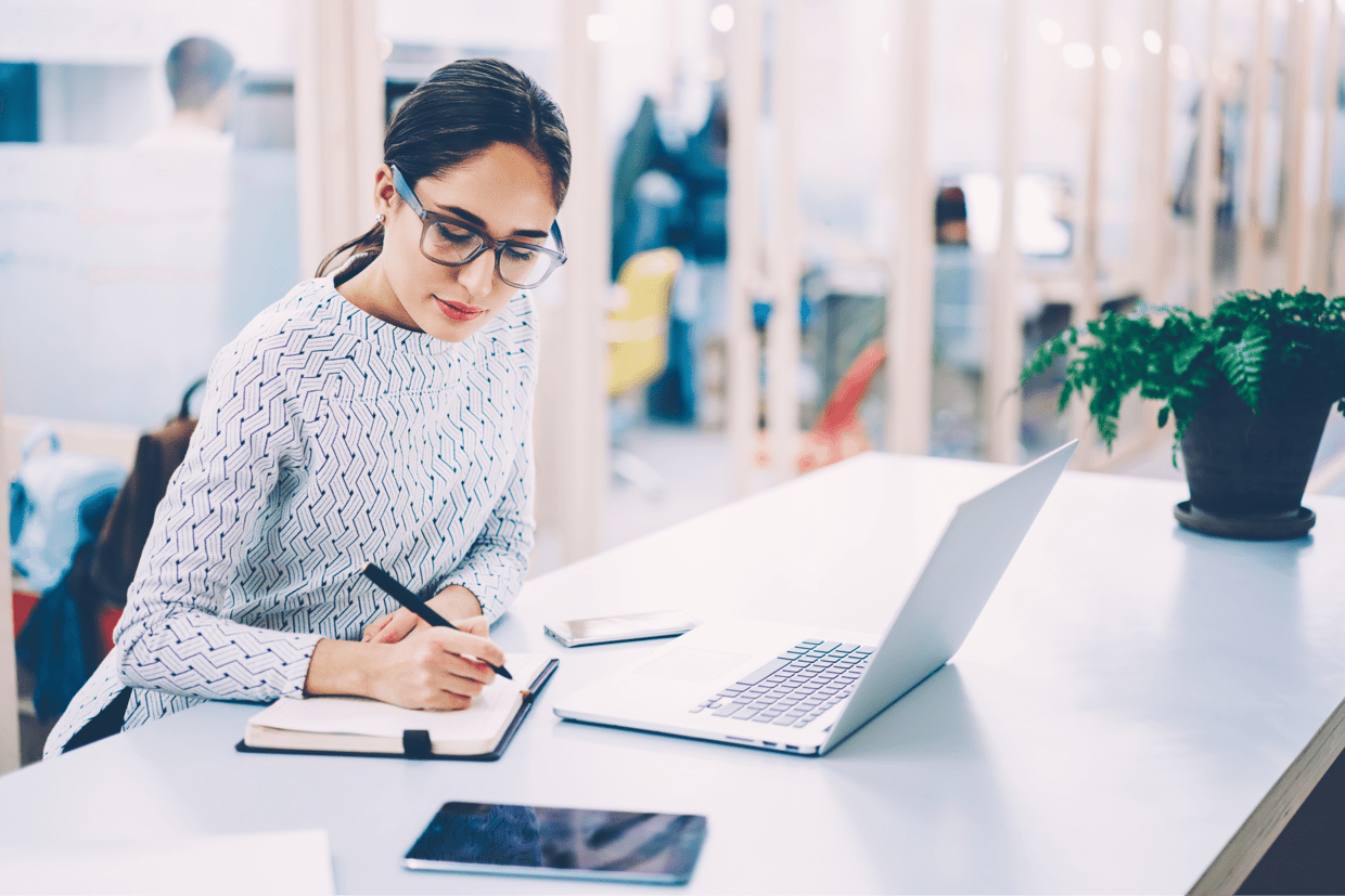 business woman behind laptop business woman behind laptop