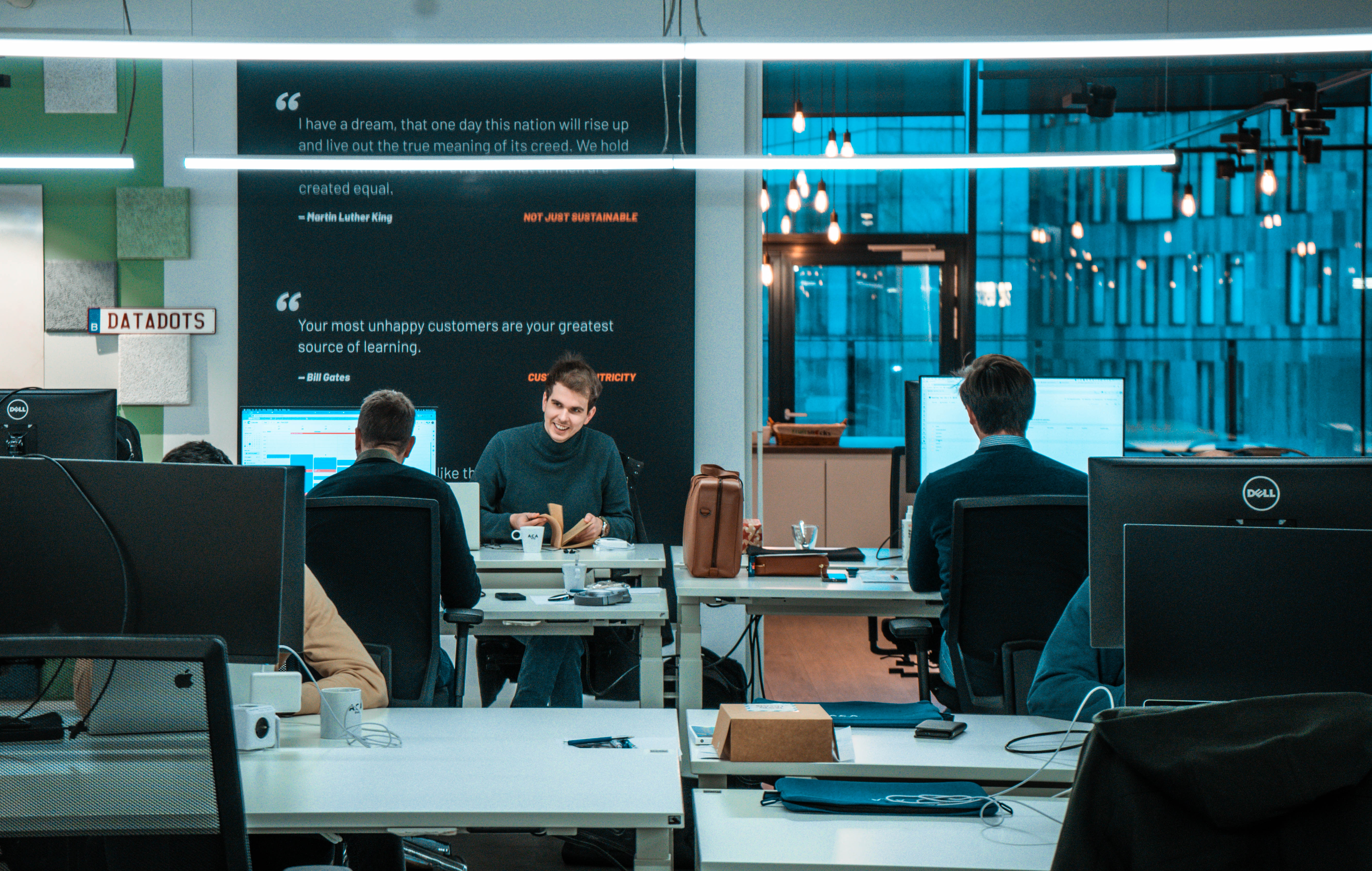 Colleagues working in open space